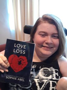 love and loss giveaway: author with book
